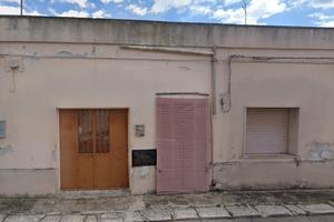 Casa a schiera con grande giardino privato