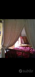 Letto a baldacchino