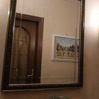Specchio con cornice in radica 