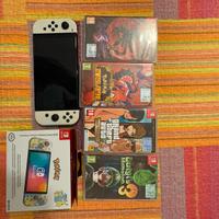Nintendo switch oled completa +giochi+ 2 portaswic