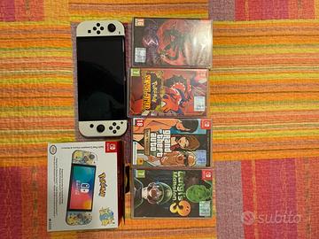 Nintendo switch oled completa +giochi+ 2 portaswic