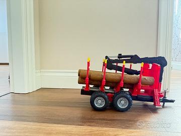 Bruder rimorchio scavatore con tronchi