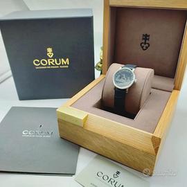 Corum Coin Watch 500 Lire Caravelle Rigirate Abbigliamento e