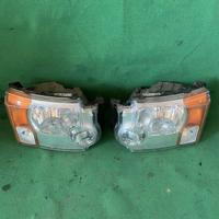Fanali anteriori destro e sinistro originali Land 