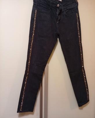jeans Zara con banda lucciccante 