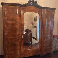 camera da letto in radica e marmo