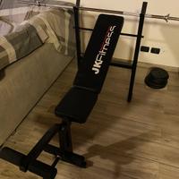 Panca JK Fitness con bilancere e pesi