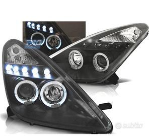 FARI PER TOYOTA CELICA T23 99-05 LED OCCHI ANGELI 
