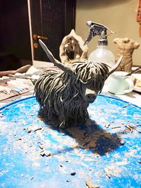 Sculture in creta cruda