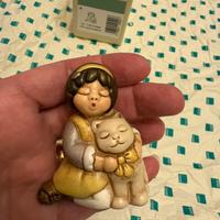 Bimba con gattino Thun