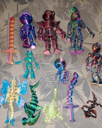 12 figure STAMPATI IN 3D