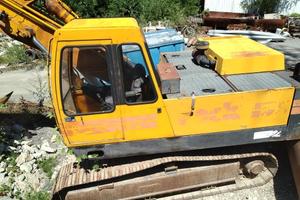 Escavatore rock 135 con martellone