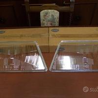 Vetri fari anteriori "Hella" SAAB 9000