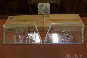 Vetri fari anteriori "Hella" SAAB 9000