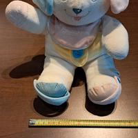 Cagnolino di peluche Chicco con sonagli