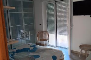 Appartamento con terrazzo semi-indipendente