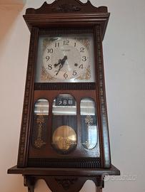 orologio a pendolo da muro