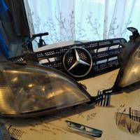 Fanali anteriori + mascherina Mercedes ML