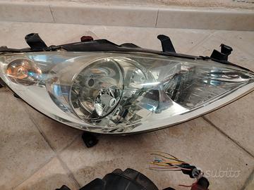 fari Peugeot 307 + altri componenti 