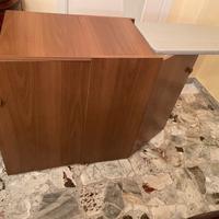 Mobile stiro con piano a scomparsa.