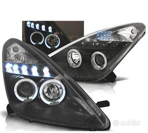 FARI TOYOTA CELICA T23 99-05 LED OCCHI ANGELI NERI