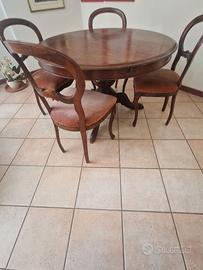 Tavolo noce rotondo diam.120 aperto diventa ovale