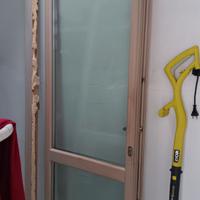 Porta finestra in legno doppia anta