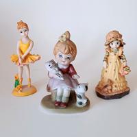 Lotto di tre statuine in porcellana 
