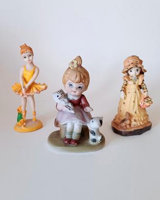 Lotto di tre statuine in porcellana 