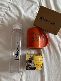 Set: bottiglia, tazza Feltrinelli e candela