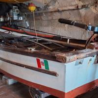 Lancia Barca in legno con remi