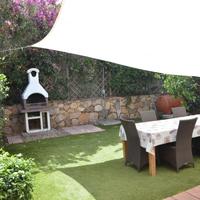 Trilocale centrale con giardino e posto auto