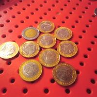 n 45 monete di  metallo  da 1000 lire 