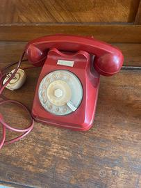 Telefono vintage rosso a rotella anni ‘70