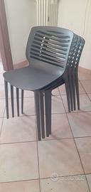 quattro sedie moderne in Polipropilene grigie