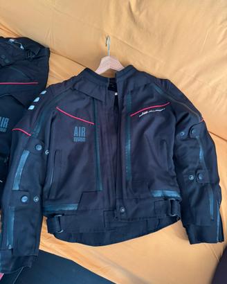 pantalone e giacca donna moto con protezioni