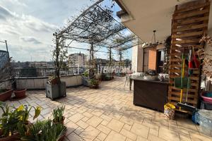 ATTICO CON TERRAZZI PERIMETRALI