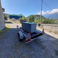 Carrello portamoto con cassone portaricambi