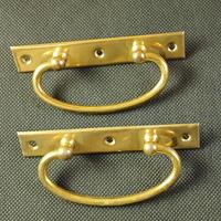 Coppia di maniglie in ottone