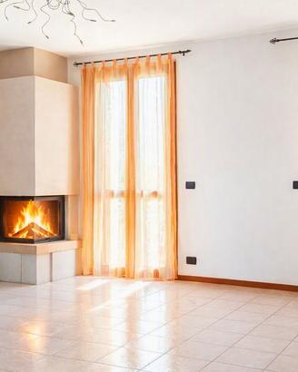 Appartamento bicamere su due livelli con caminetto