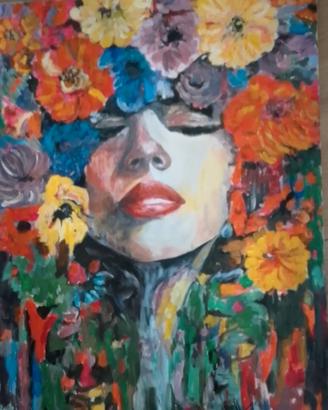 VOLTO DI DONNA TRA I FIORI