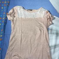 maglia rosa con pizzo bianco a maniche corte