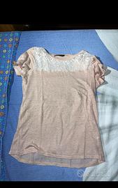 maglia rosa con pizzo bianco a maniche corte