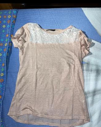 maglia rosa con pizzo bianco a maniche corte