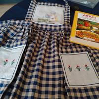 libro di cucina Artusi con grembiule