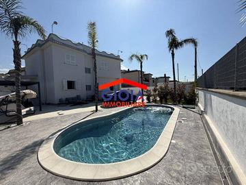 Villa di 245 m² con più di 5 locali e box auto dop