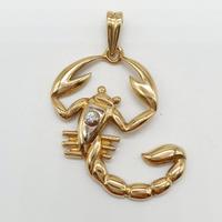COD.373.25 CIONDOLO SCORPIONE ORO GIALLO 18K 750
