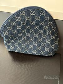 Pochette stampa gucci