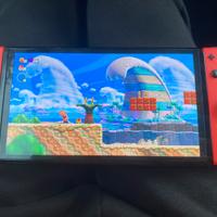 Switch oled mario edition (rouge)