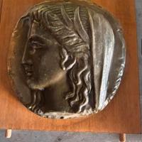 moneta riprodotta su legno